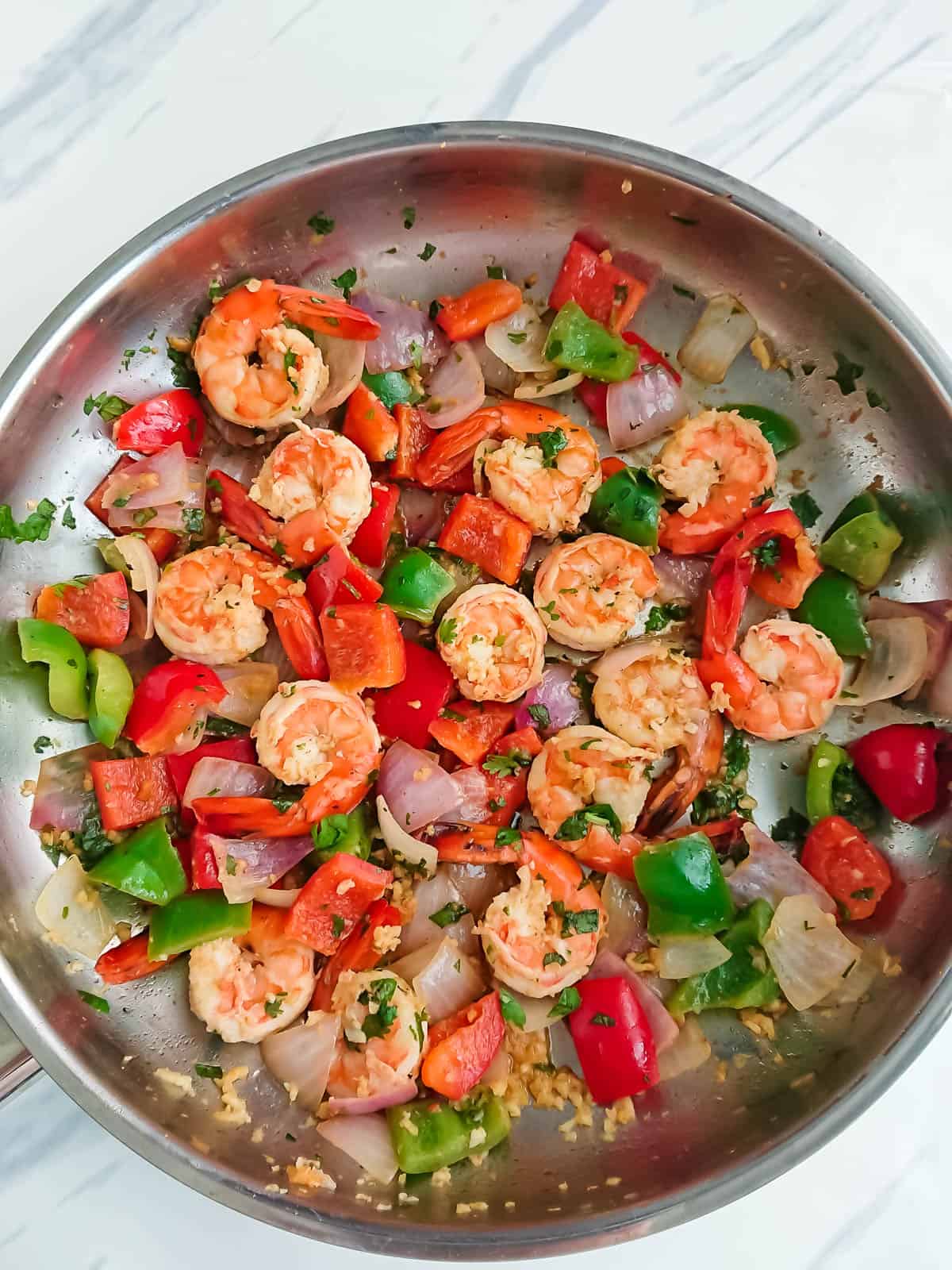 garlic shrimps\prawns in a stainless steel pan