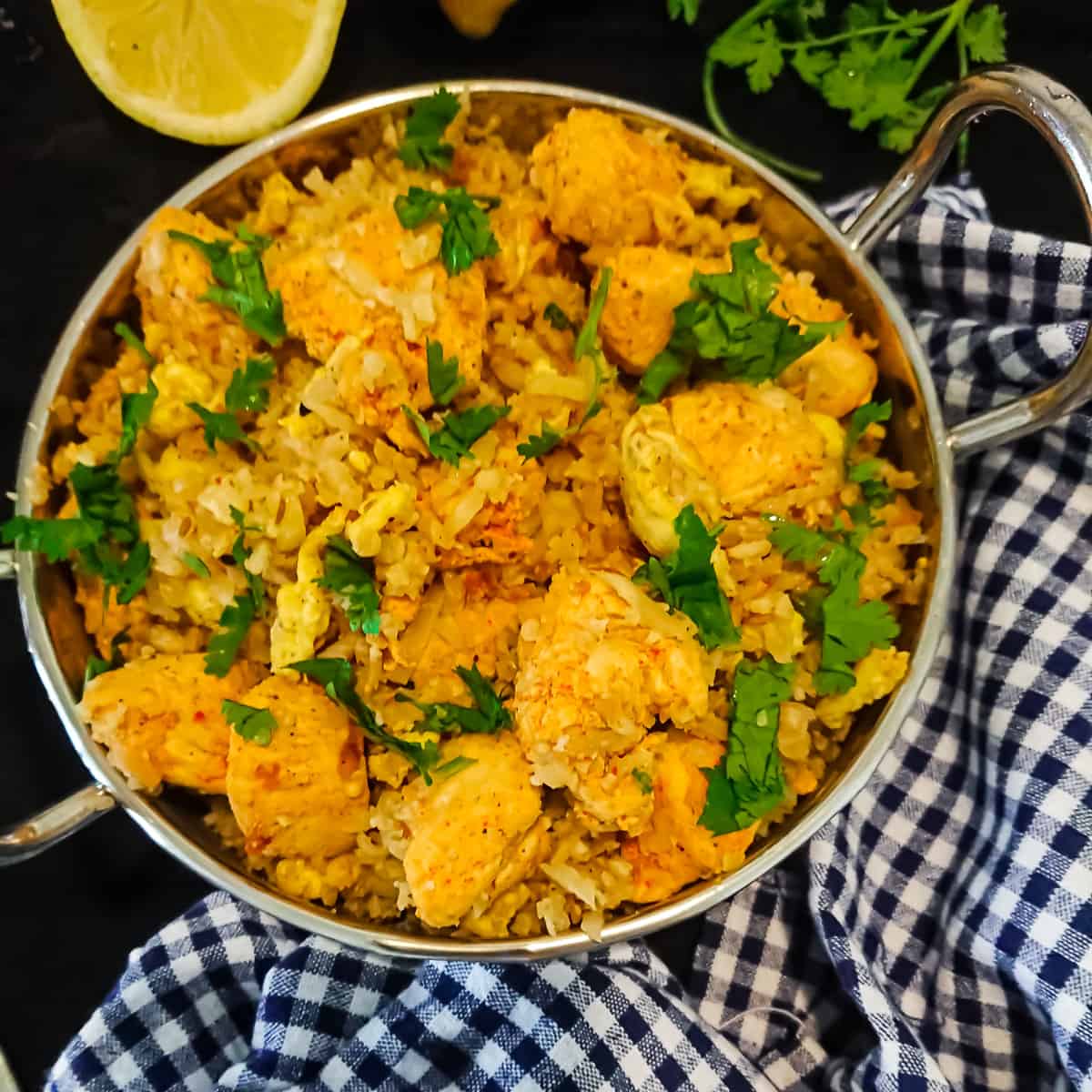 keto chicken biryani in a metal bowl.