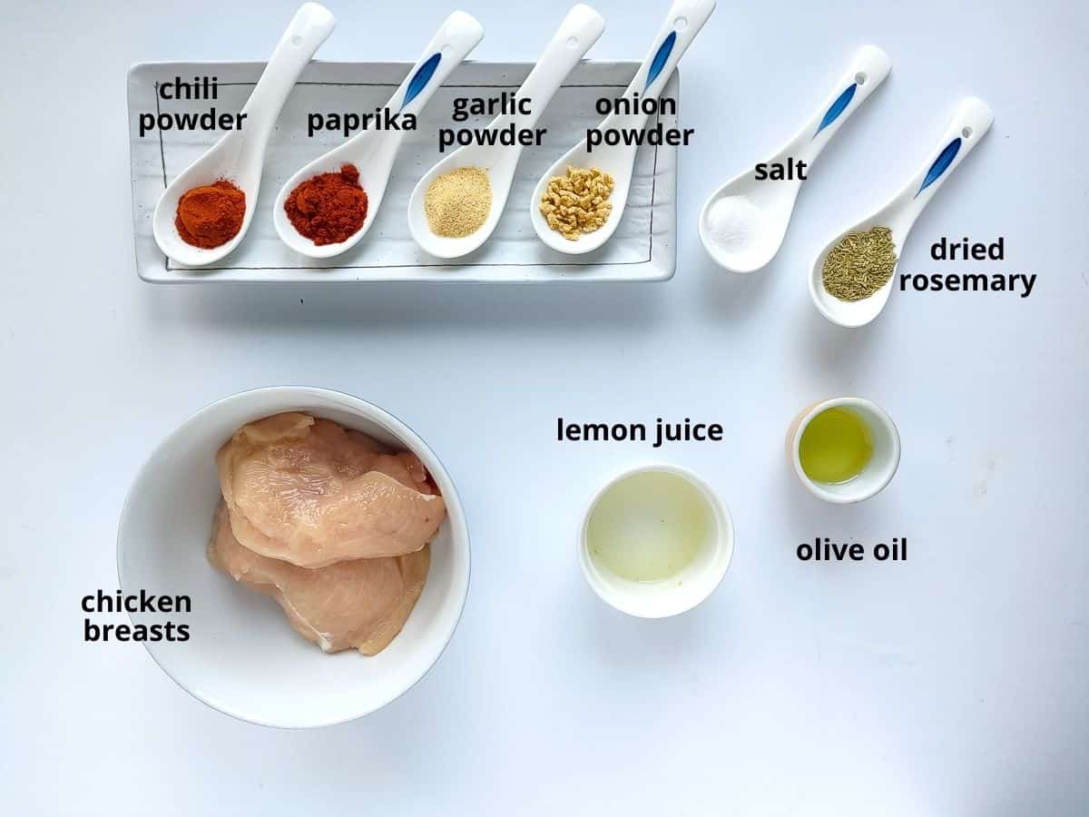 Labelled ingredients for baking thin sliced chicken breasts.