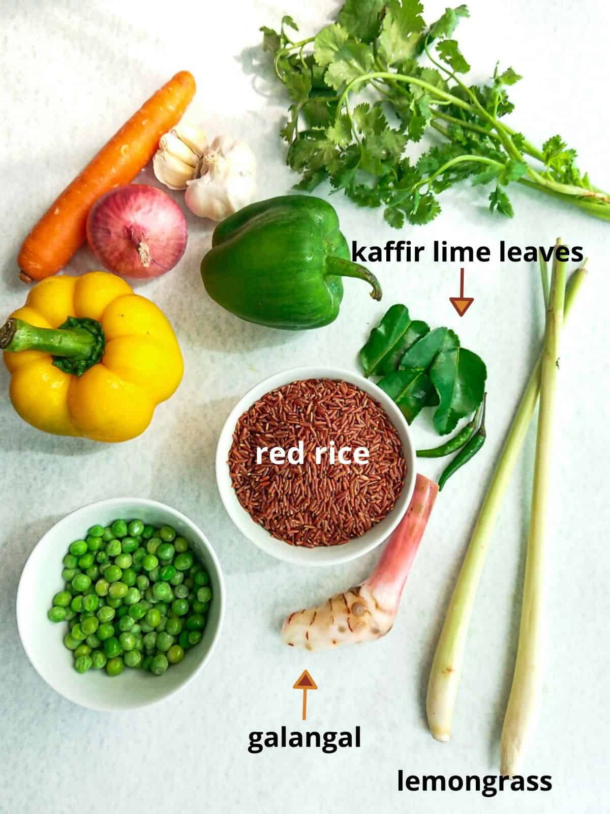 Labelled ingredients for Thai vegetarian fried rice recipe with red rice.