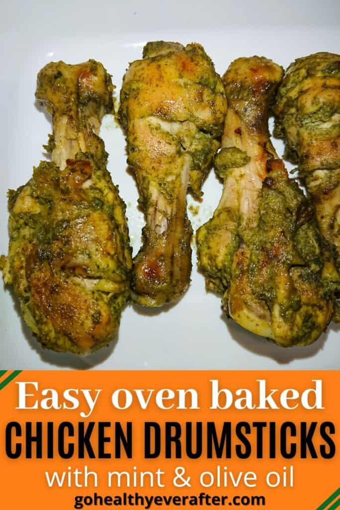 easy oven baked chicken legs in a white tray