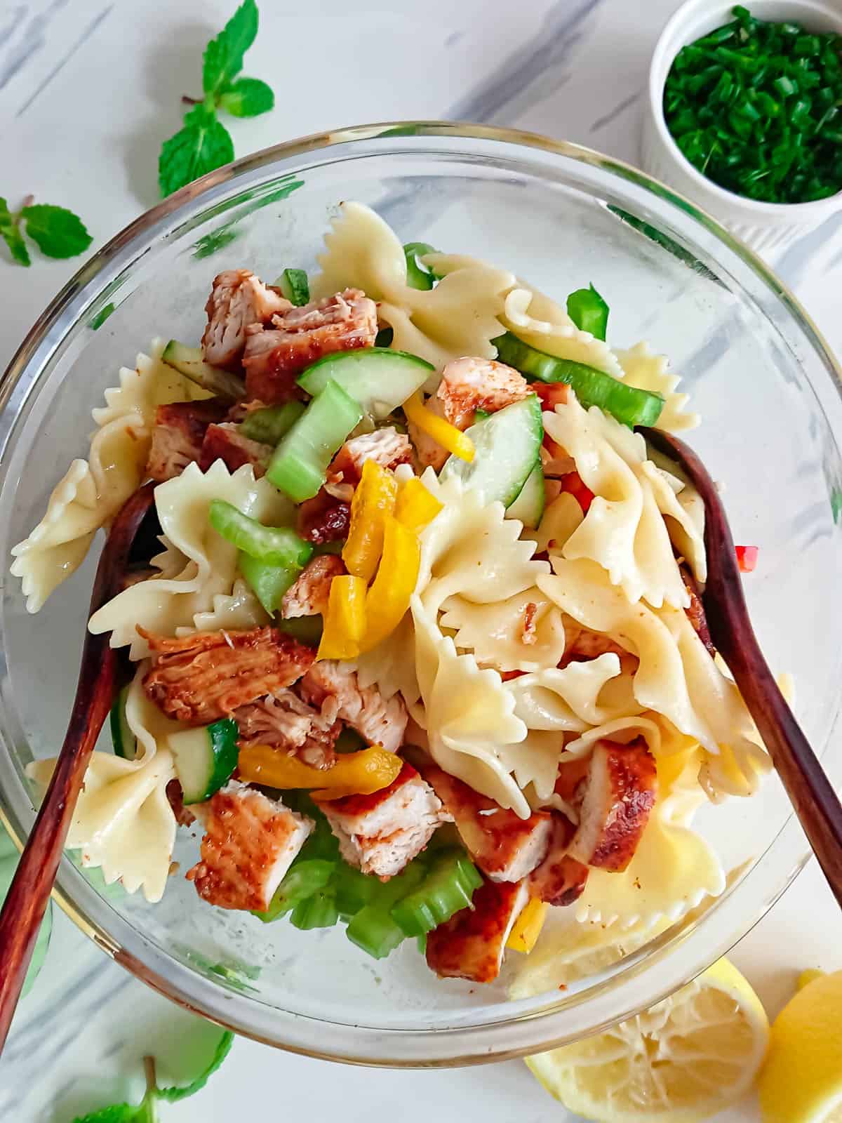 Creamy Veggie Chicken Salad with Pasta Top view of high protein pasta salad in a glass bowl.