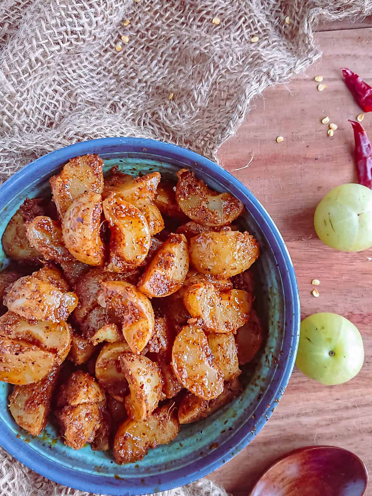 Instant gooseberry pickle in a blue bowl.