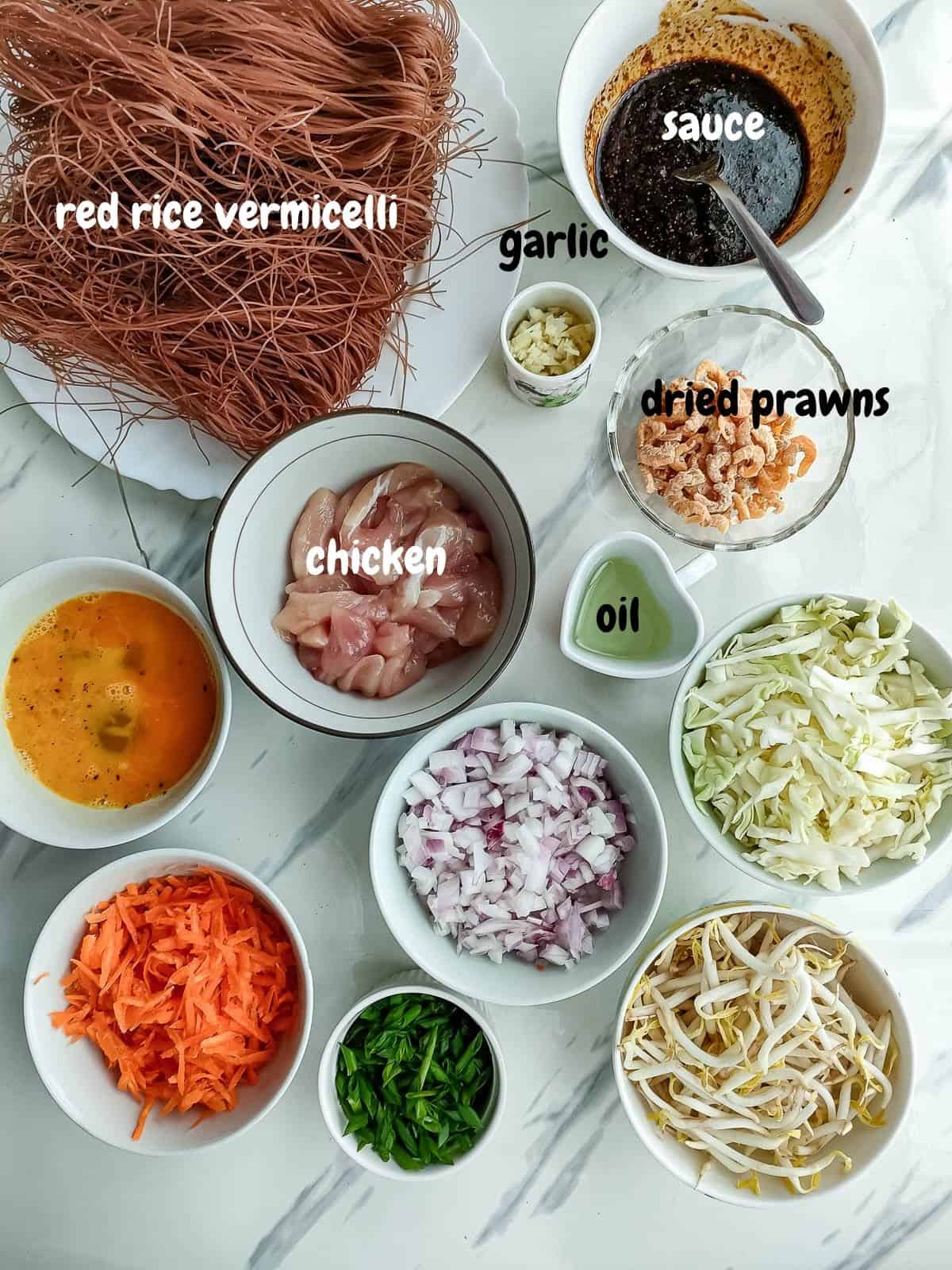 Labelled ingredients for Singapore street noodles recipe.