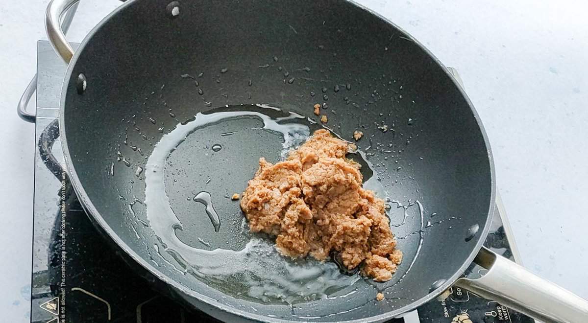 Onion paste being sauteed for authentic chana masala gravy.