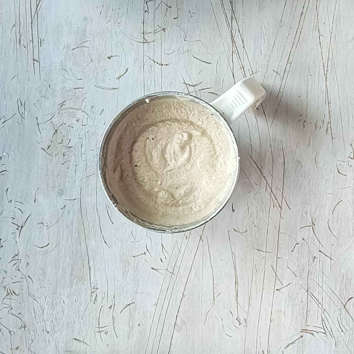Coconut-almond paste for chicken kofta curry in a blender jar.