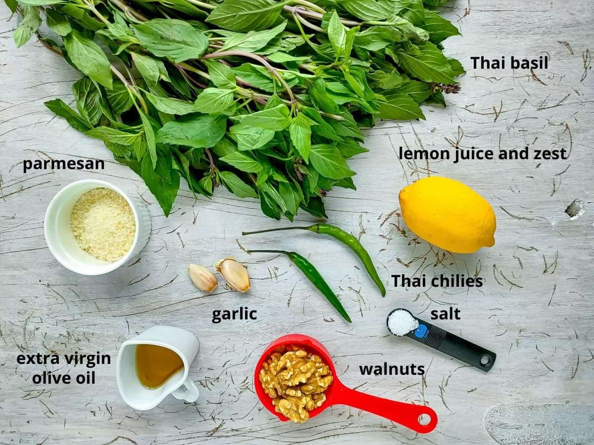 Labelled ingredients for green chilli pesto with Thai basil.