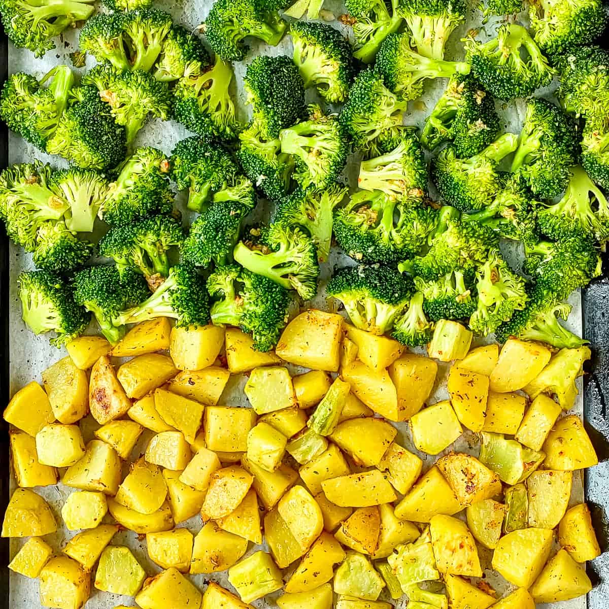Roasting potatoes and broccoli on a sheet pan.