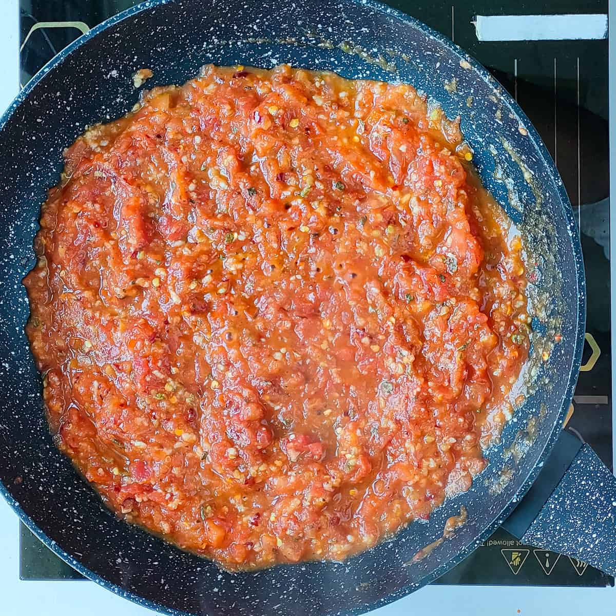 Spicy spaghetti sauce in a non-stick pan.