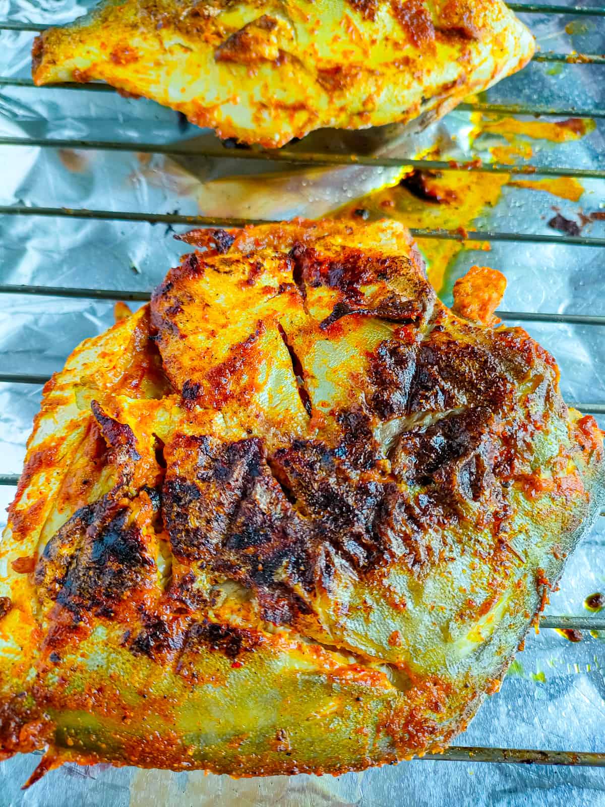 tandoori pomfret on an oven grill