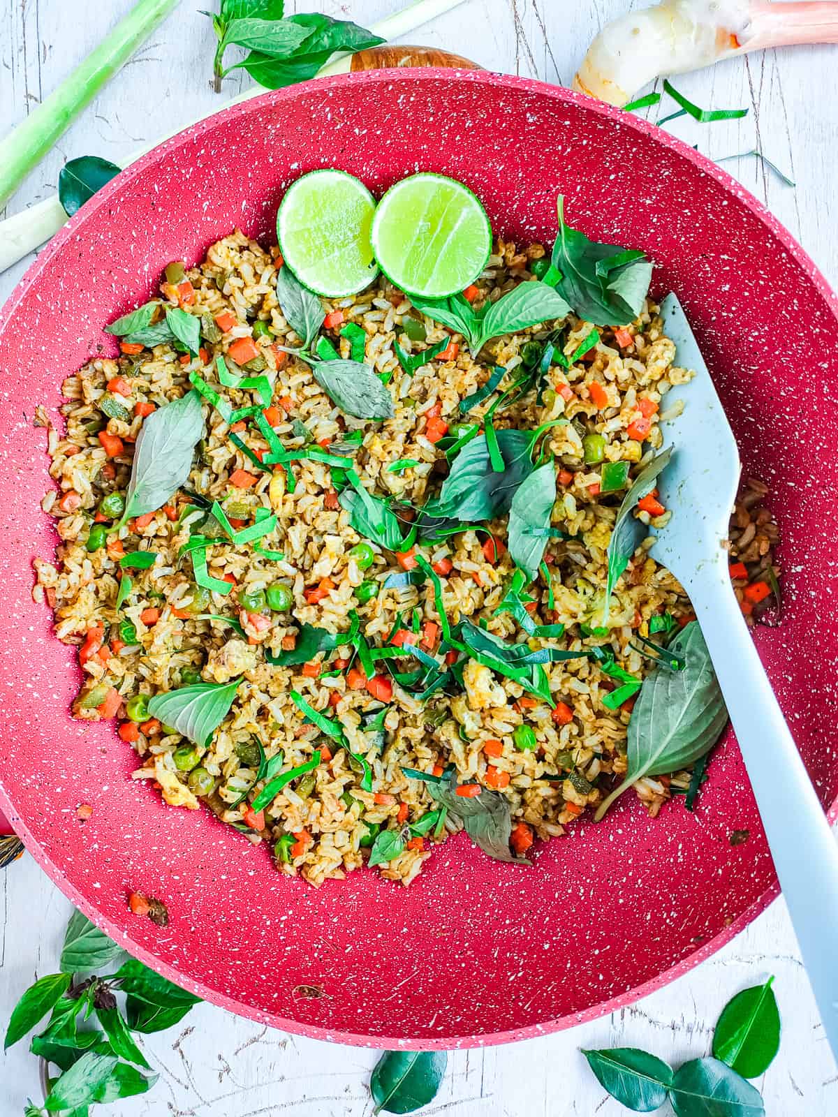 Thai green curry rice in a non-stick wok pan.