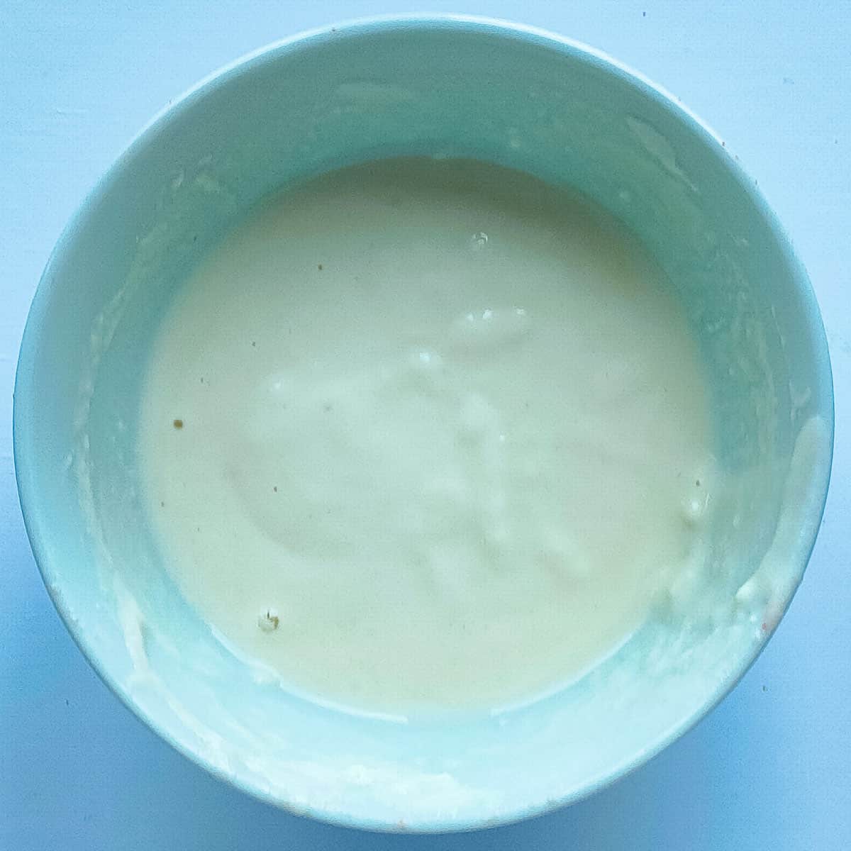 Flour-water mixture in a white bowl.