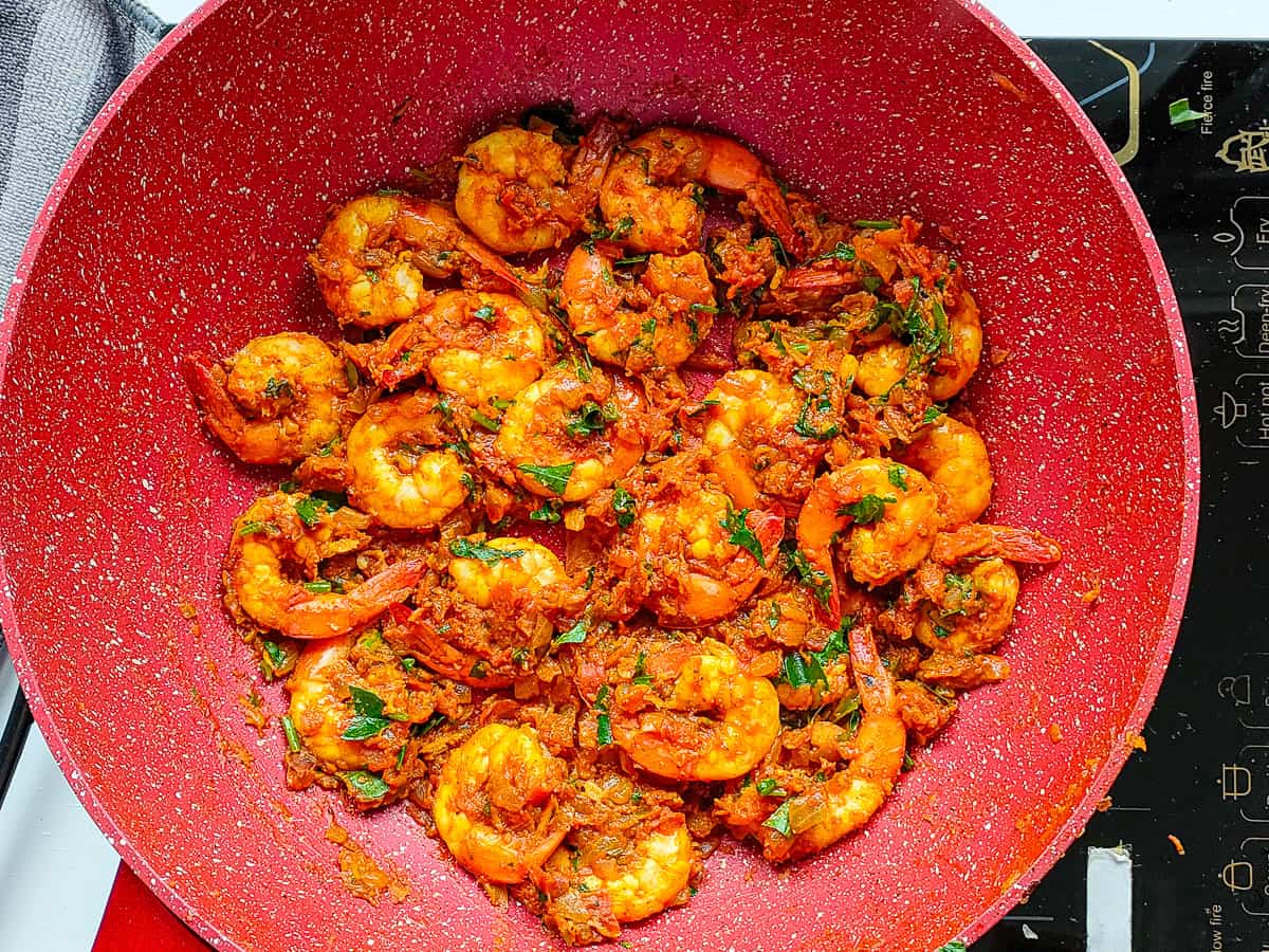 Prawns masala in a non-stick pan.