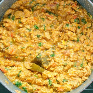 Chicken qeema curry in a non-stick pot.