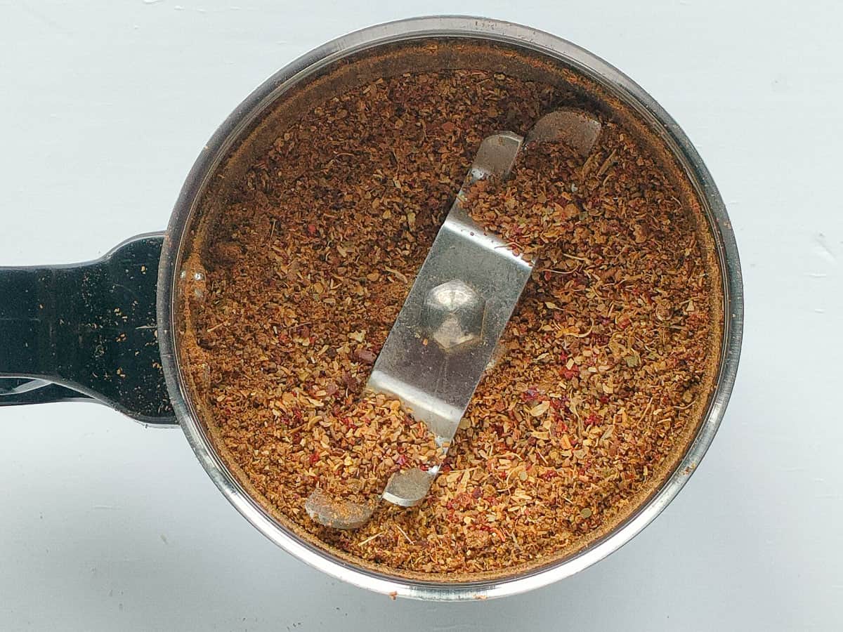 Ground kadai masala powder in a blender jar.