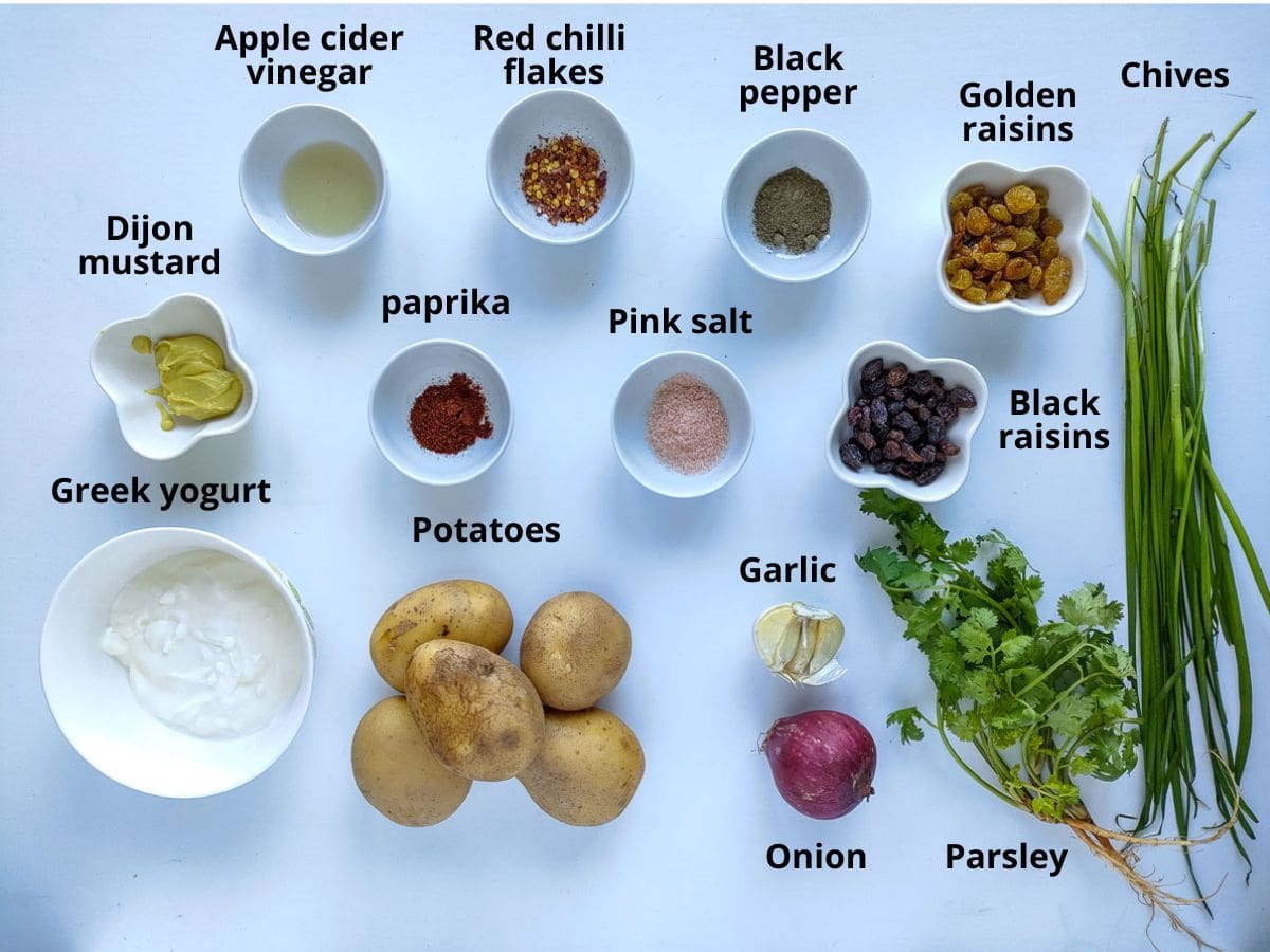 Labelled ingredients for no mayo potato salad with raisins
