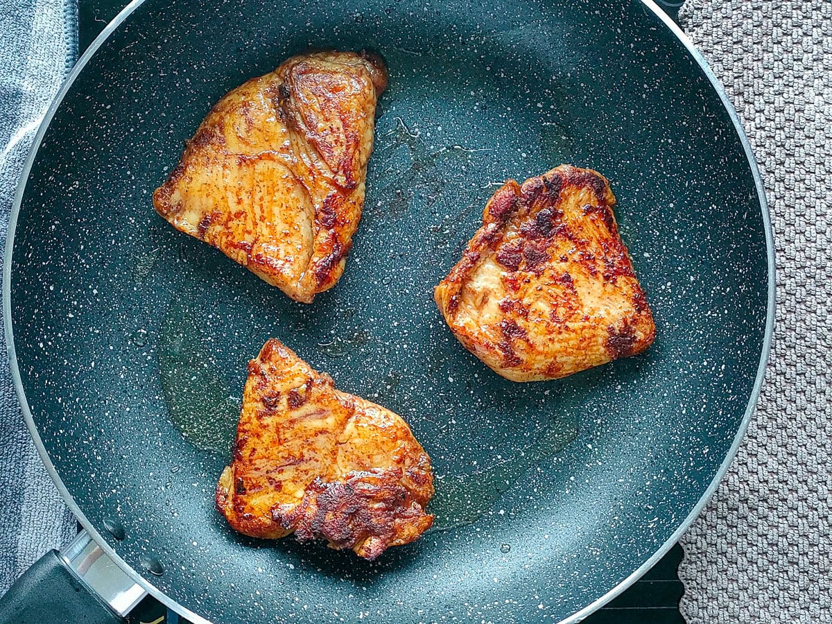 Wholesome Chipotle Chicken Sandwich with Easy Avocado Spread Cooked chipotle chicken on a pan.