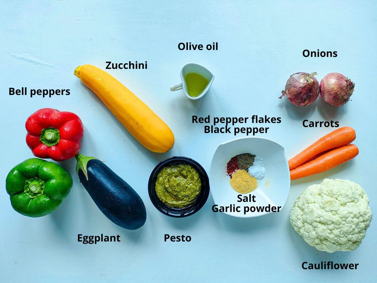Easy Roasted Pesto Vegetables (Mediterranean style) Labelled ingredients for Mediterranean roasted vegetables with pesto.
