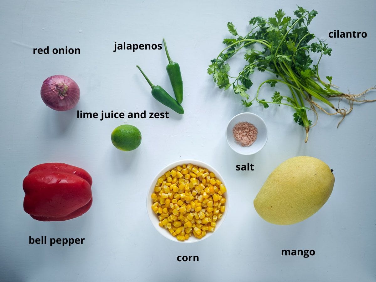 Easy Corn Mango Salsa Labelled ingredients for corn mango salsa recipe.