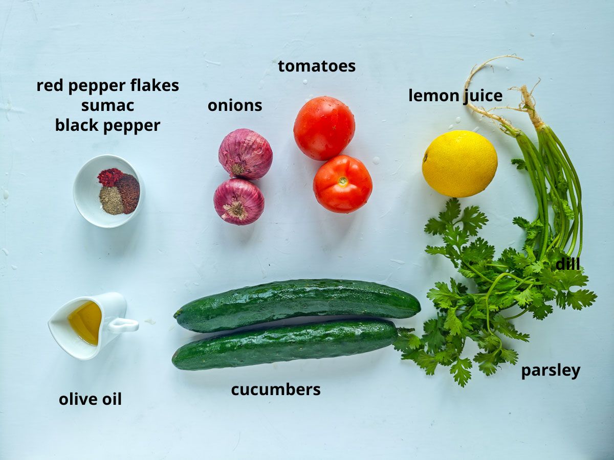 Quick Cucumber Tomato Mediterranean Salad (no dressing required) Labelled ingredients for Mediterranean cucumber salad.