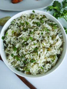 Lime cilantro rice in a white bowl.