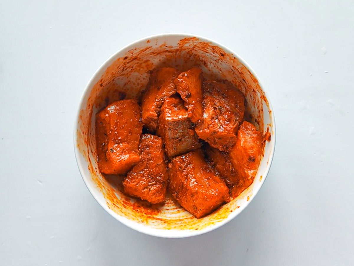 Healthy Salmon Taco Bowls with Avocado Crema Taco-seasoned salmon in a bowl.