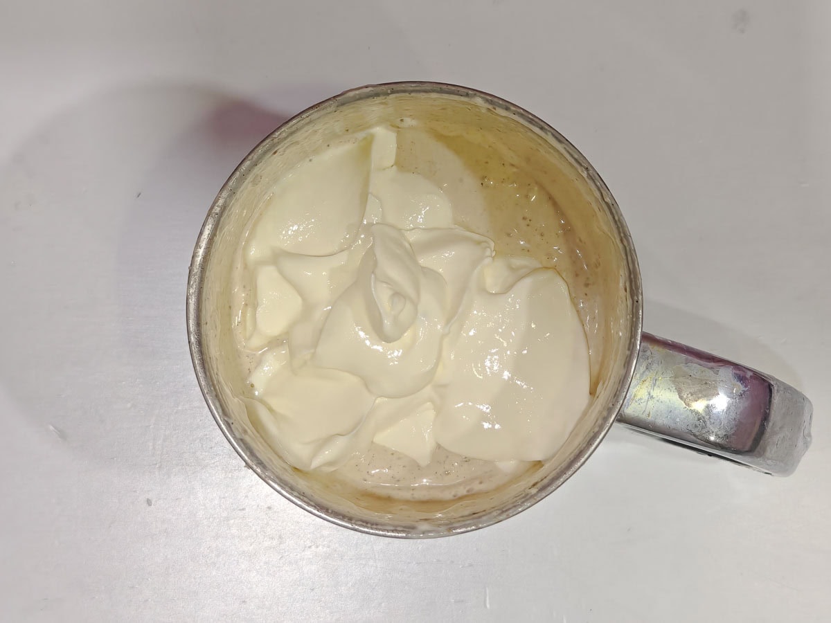 Easy Garlic Yogurt Sauce (with Roasted Garlic) Blended garlic yogurt sauce in a blender.