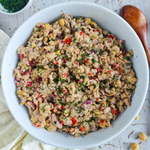 Mediterranean Chickpea Tuna Salad (No Mayo, High Protein) Chickpea salad with tuna in a large white bowl.
